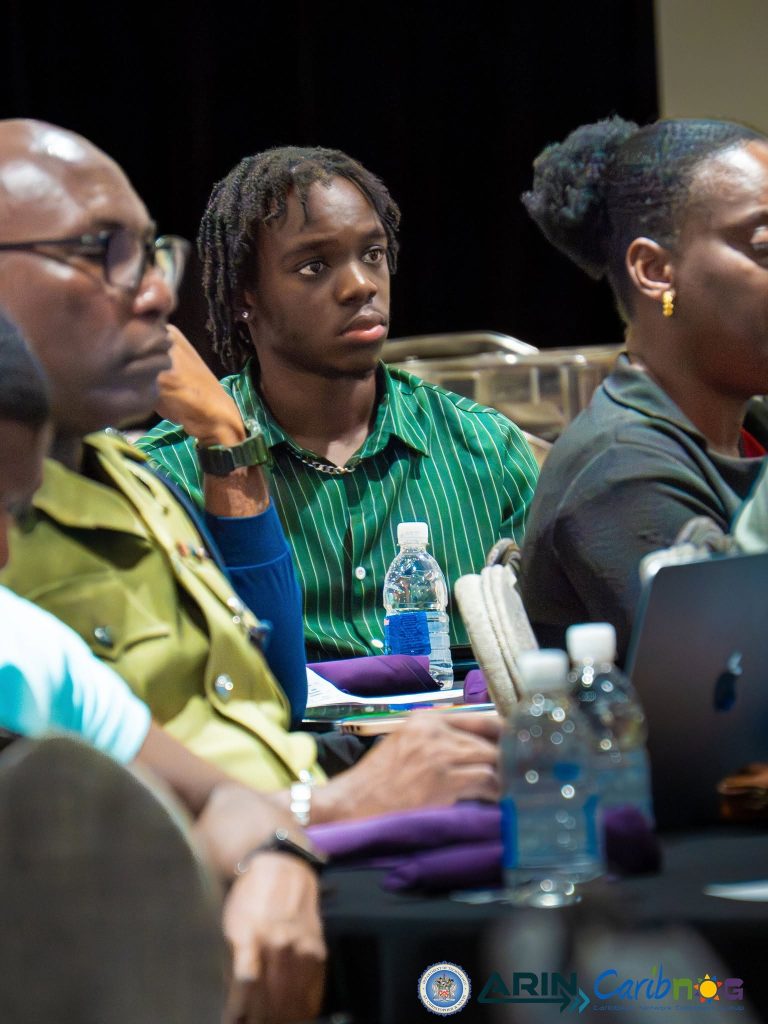 Participants listening during a session at the ARIN and CaribNOG seminar