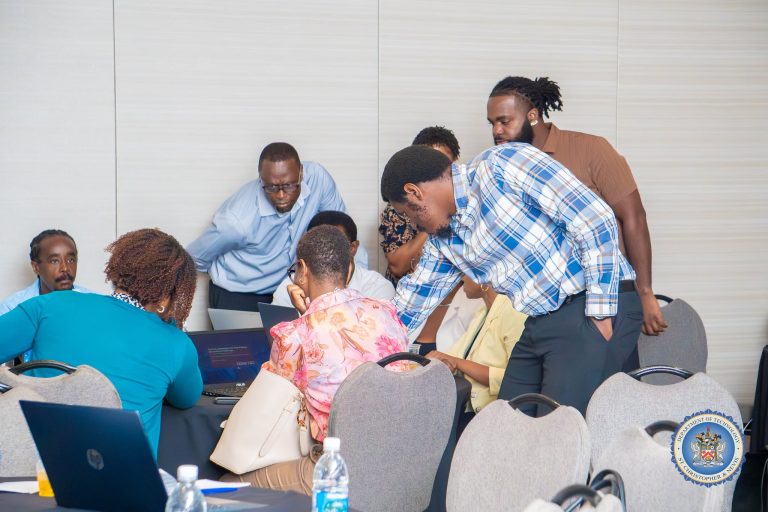Participants gathered for a group exercise at the cybersecurity workshop in St. Kitts, October 2026