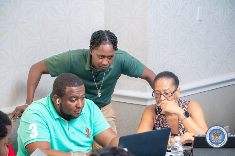 Participants collaborating during the simulated incident response exercise at the cybersecurity workshop in St. Kitts, October 2026