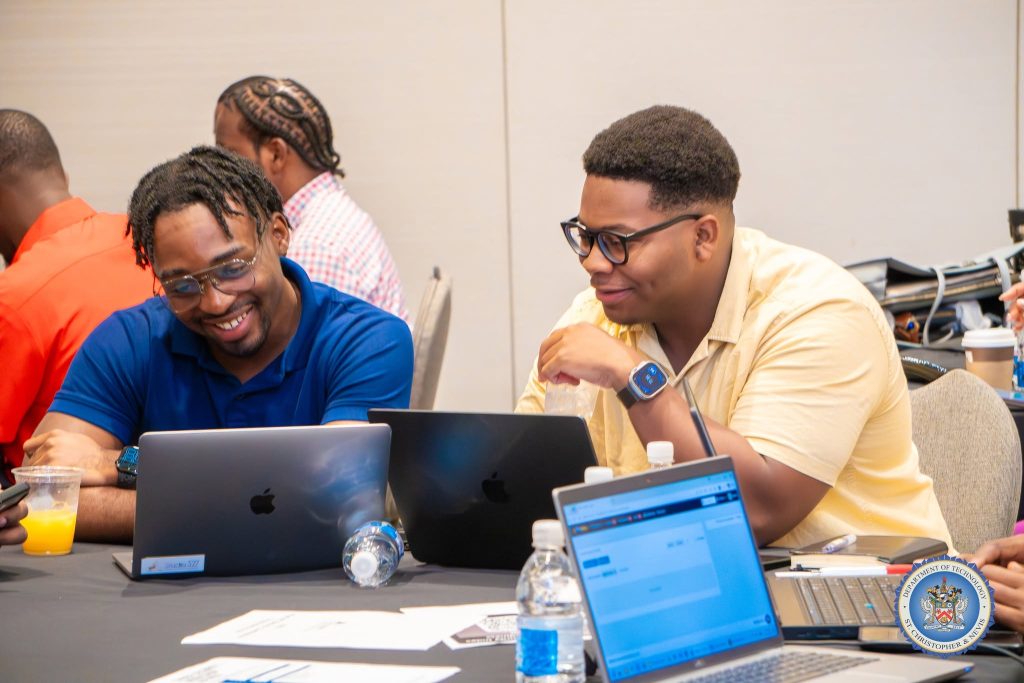 Participants working on laptops during the GCI and CIRT Readiness Assessment cybersecurity workshop in St. Kitts, October 2026