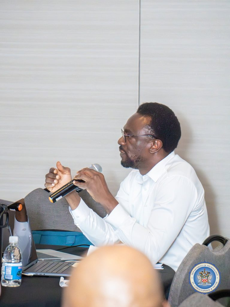 Participant taking notes during a session at the cybersecurity workshop in St. Kitts, October 2026