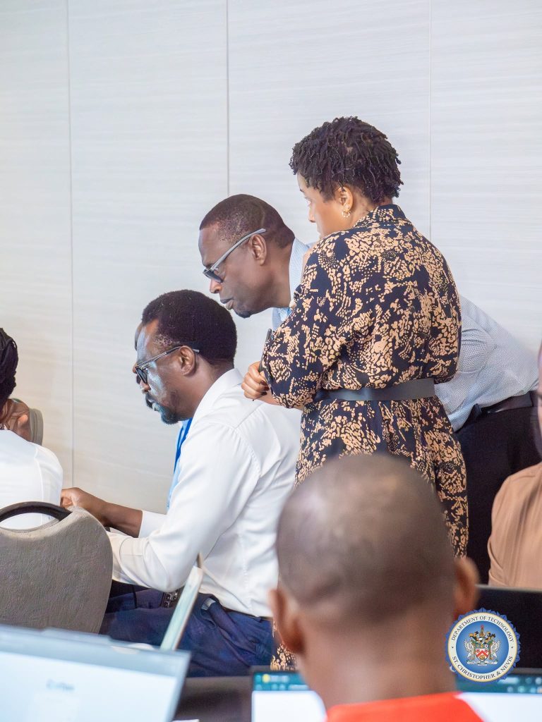 Facilitator guiding participants during a hands-on exercise at the cybersecurity workshop in St. Kitts, October 2026